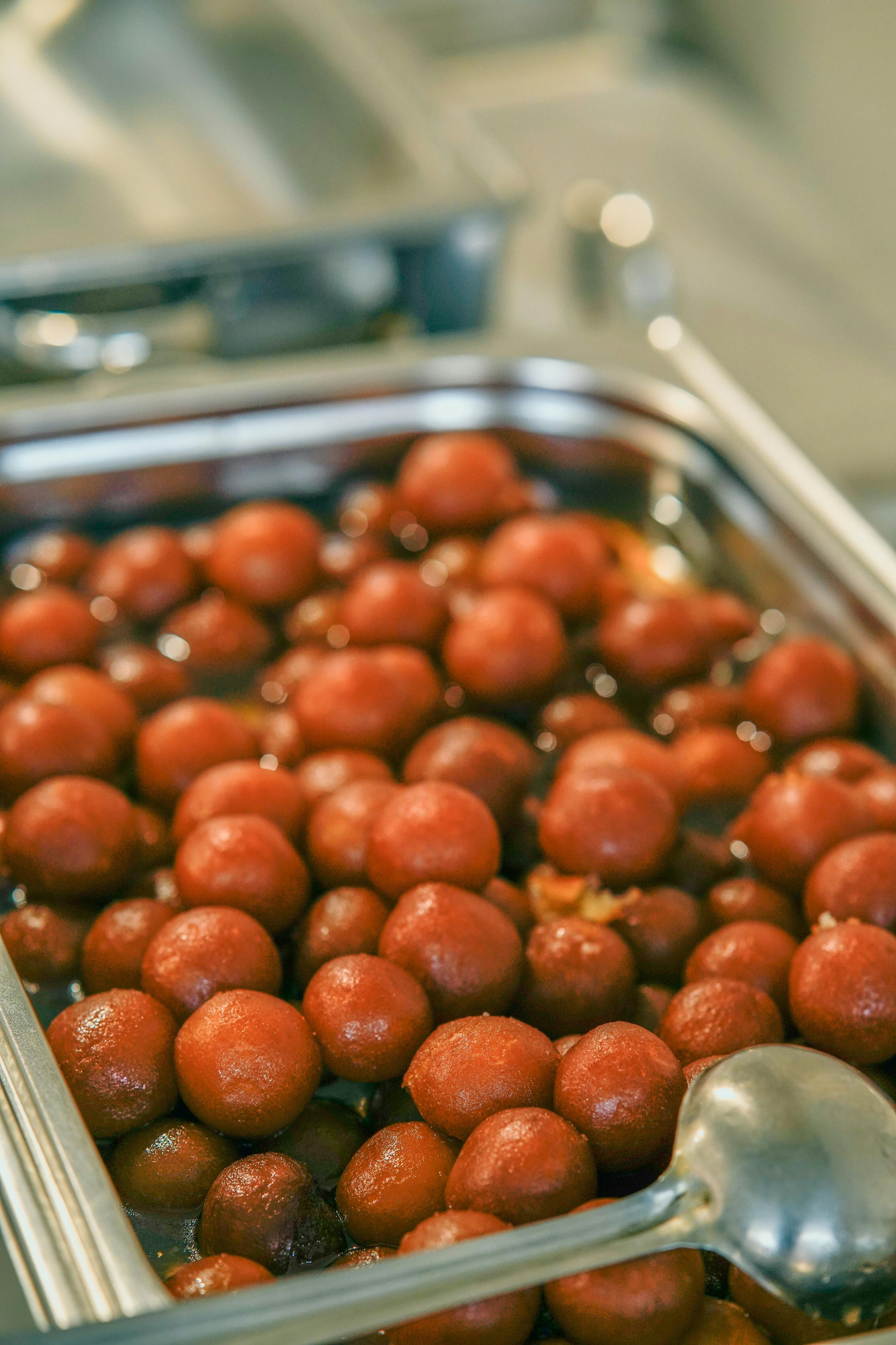 Classic Gulab Jamun served warm with silver leaf